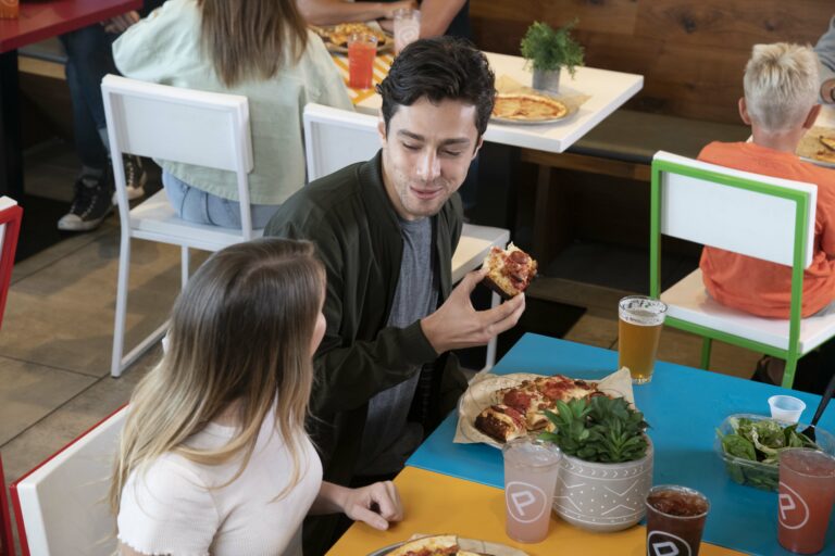 people eating at pizza fundraiser